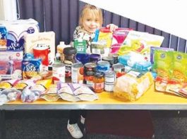 Local foodbanks see sharp rise in demand as covid bites hard Layney - instead of doing Christmas cards at school she bought food for the foodbank.