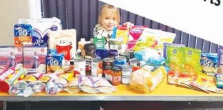 Local foodbanks see sharp rise in demand as covid bites hard Layney - instead of doing Christmas cards at school she bought food for the foodbank.