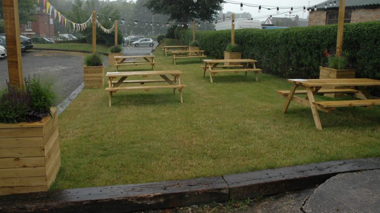 Town charity helps Young Pretender to build its new beer garden