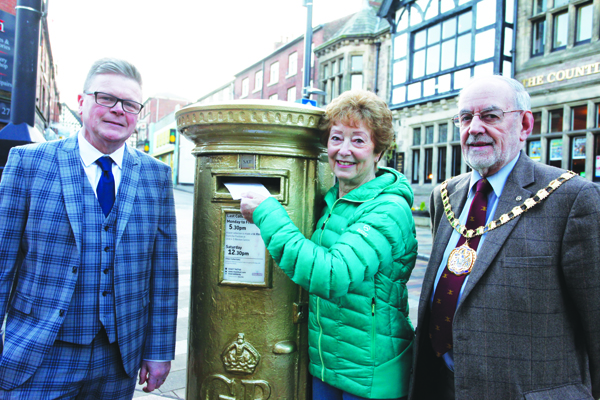 The post box painted gold to honour Olympian Ann Brightwell.