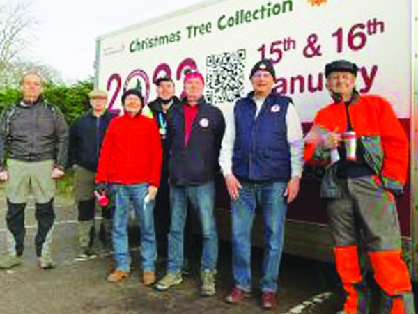 Tree collection brings total raised to £1.5m Volunteers at the hospice preparing for the tree collection.