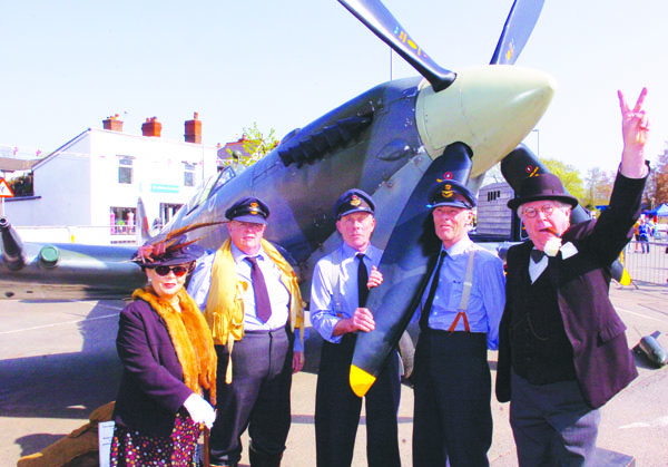 A mark IX Spitfire was the star of the show in 2018. From left, Lyn Gumm, Mark Anthony Craig, Steven Heapey, Melvyn Heapey and Richard Gumm. (1722c/18).