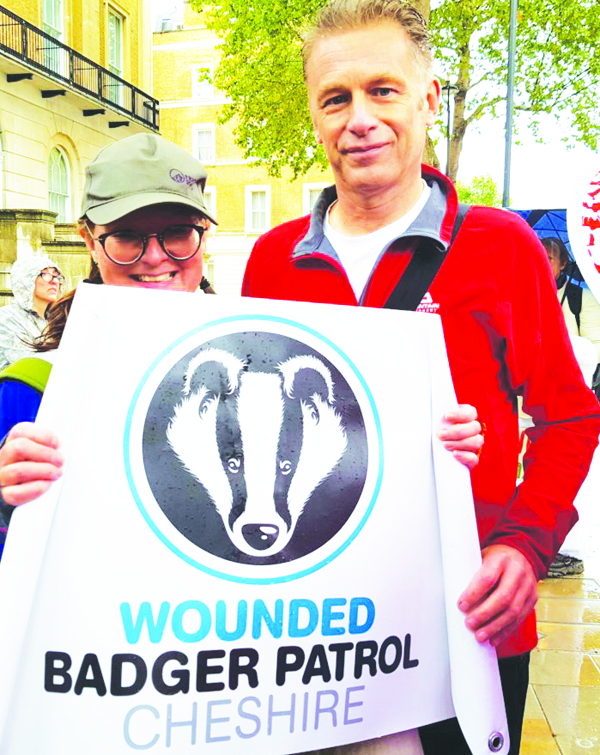 Protests clampdown ‘has to be opposed by moral citizens’ Mrs Smith with wildlife campaigner Chris Packham OBE, who gave his support to the Wounded Badger Patrol Cheshire group in Whitehall at his People's March for Wildlife in 2020.