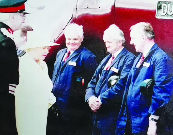 From left, HM the Queen, Gareth Jones (traction inspector), Bob Morrison (driver) and Mr Hart.