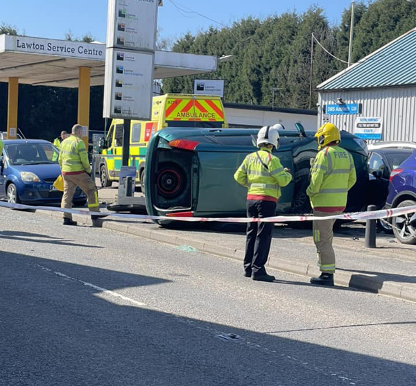 Vehicles damaged at repair centre after car overturns