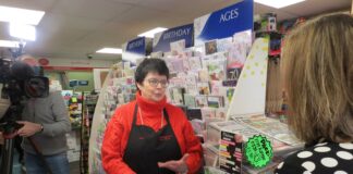 TV news focuses on plight of sub-postmistress Jane Bostock Gibson.