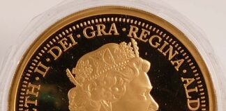 Auctioneer breaks house record with a £49,000 gold coin