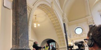 Anti-racism protestors bring meeting to a halt