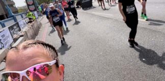 Marathon runner signs up from hospital bed