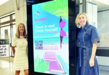Women being asked to check them over after holiday check-in