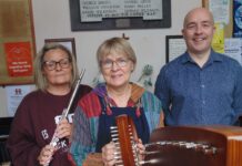 Musicians play on the porch in Sandbach