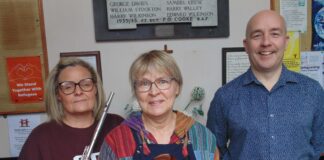 Musicians play on the porch in Sandbach