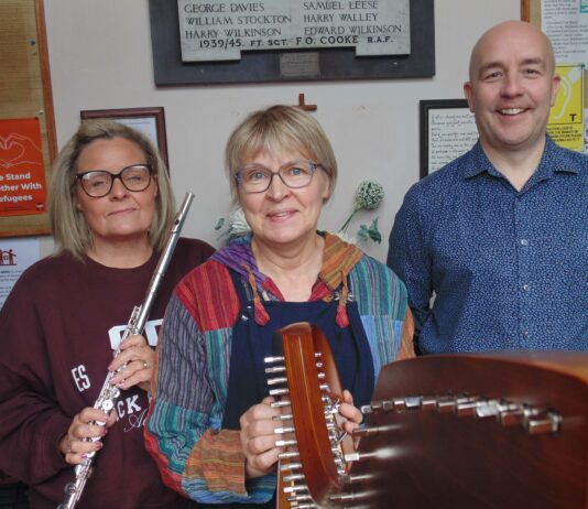 Musicians play on the porch in Sandbach